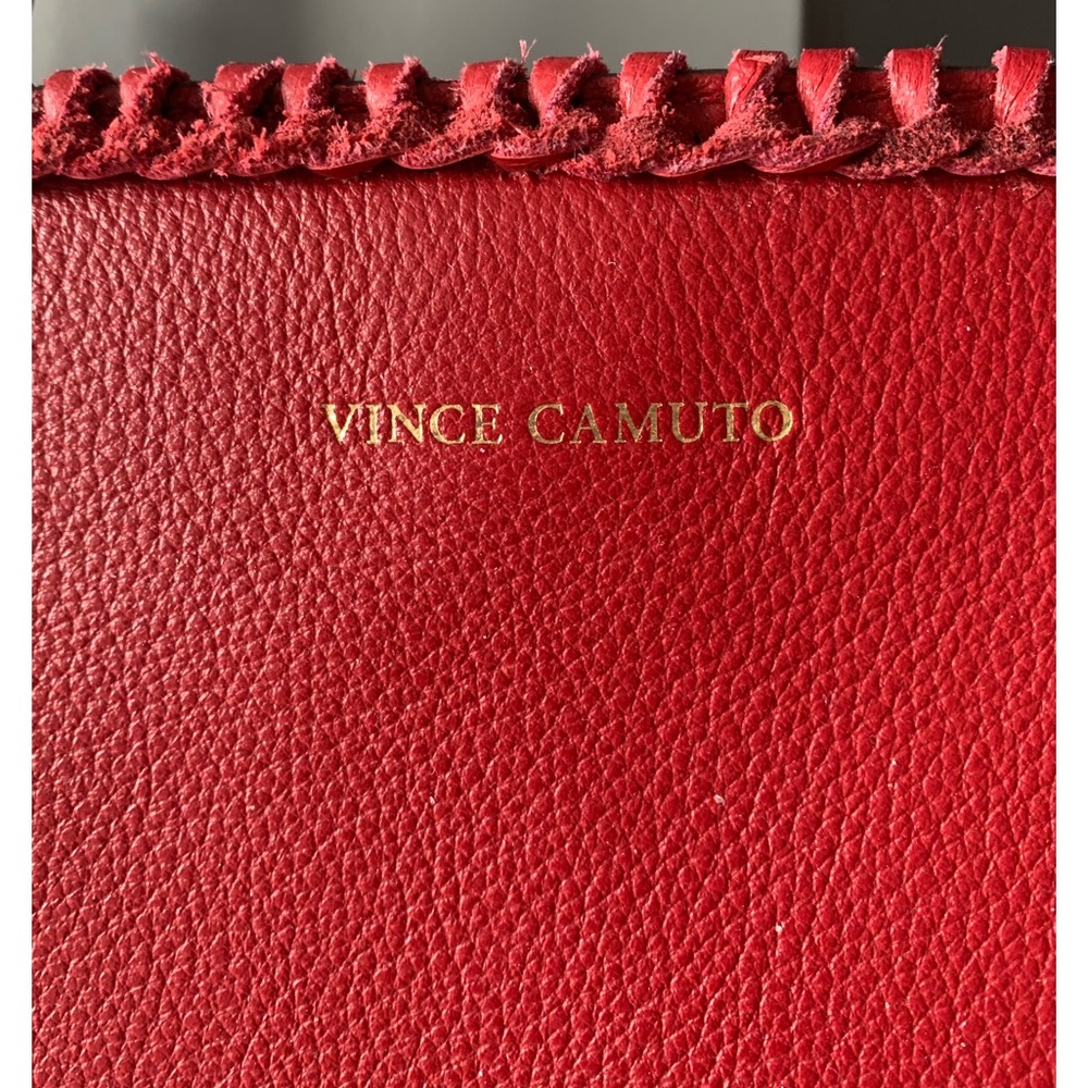 Red Vince Camuto bag with cross stitching